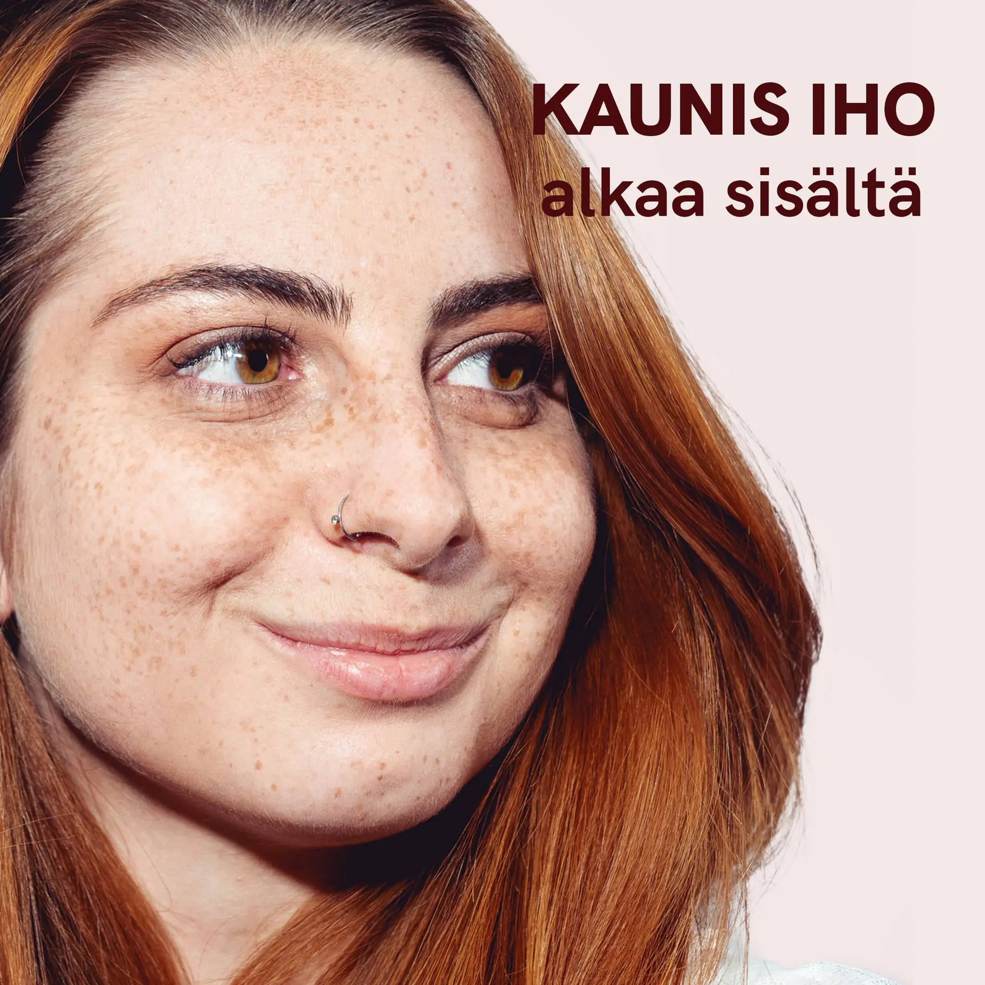 Lähikuva naisesta, jossa paljon pisamia ja punaiset hiukset; oikeassa yläkulmassa teksti 'KAUNIS IHO alkaa sisältä'.