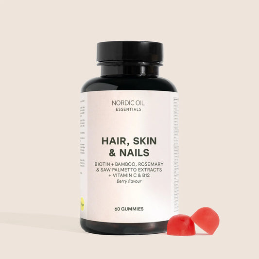 Nordic Oil Essentials Hair, Skin & Nails -kumeja purkissa (60 kappaletta) punaisine purukarkeineen kuvassa